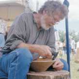Michael Combs crafting a wooden bowl.